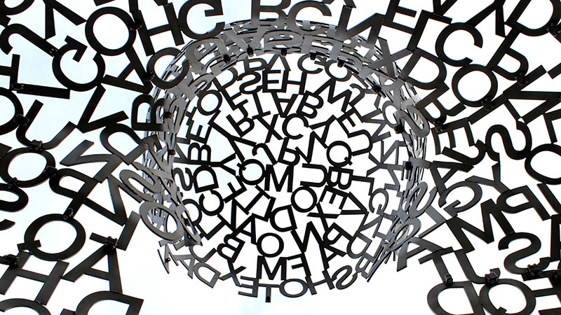 Inside a metal statue made of letters.